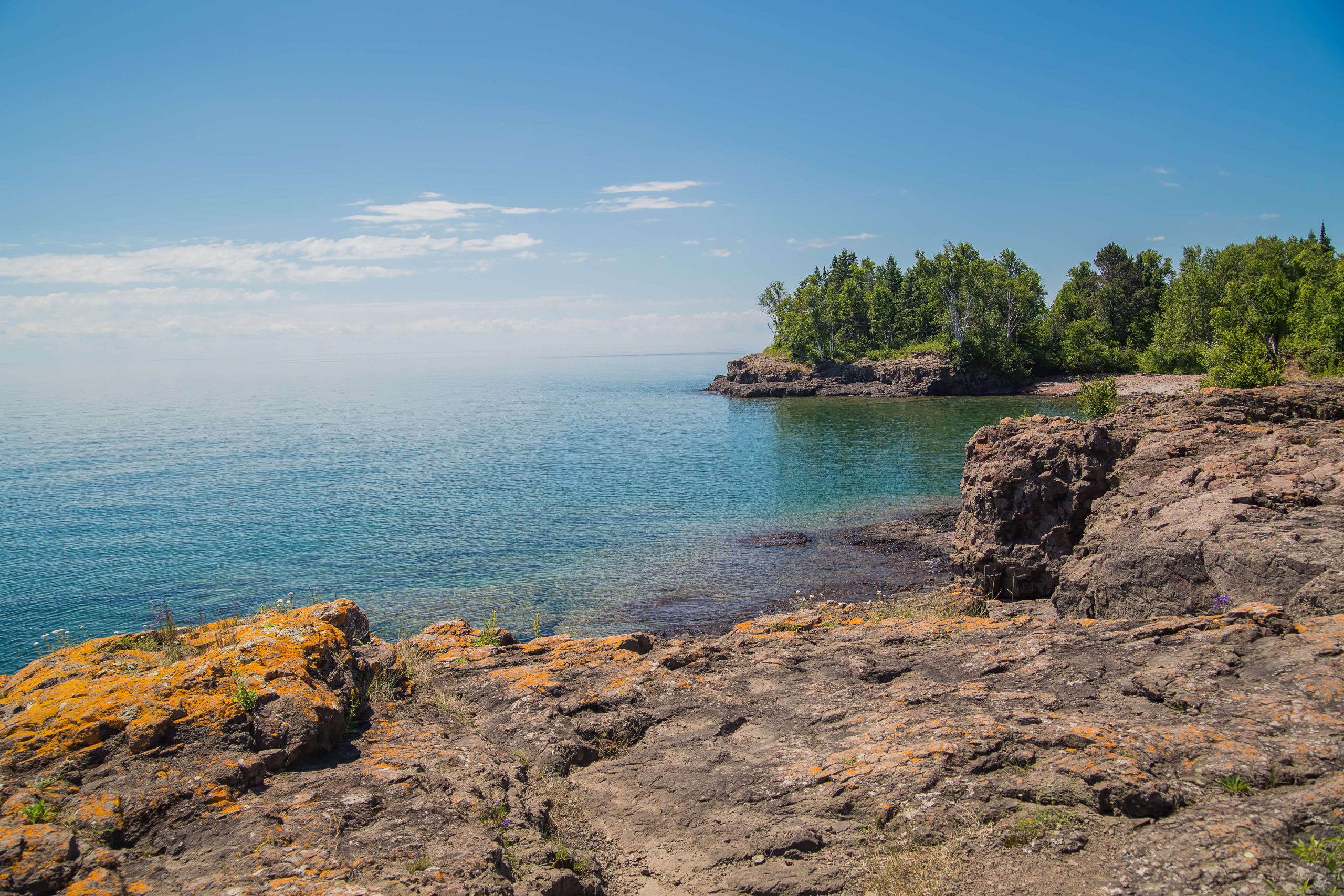 Scenic North Shore of Lake Superior in Minnesota with rocky coastline and clear blue water